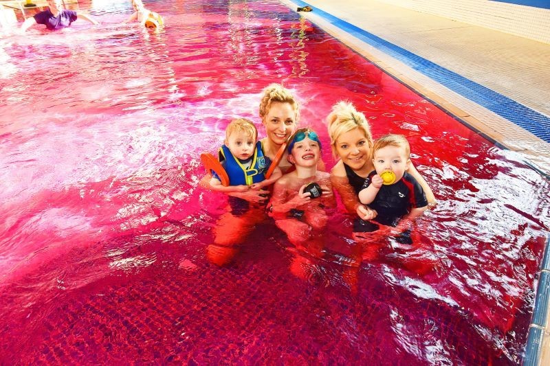 Other image for Swimmers were tickled pink...